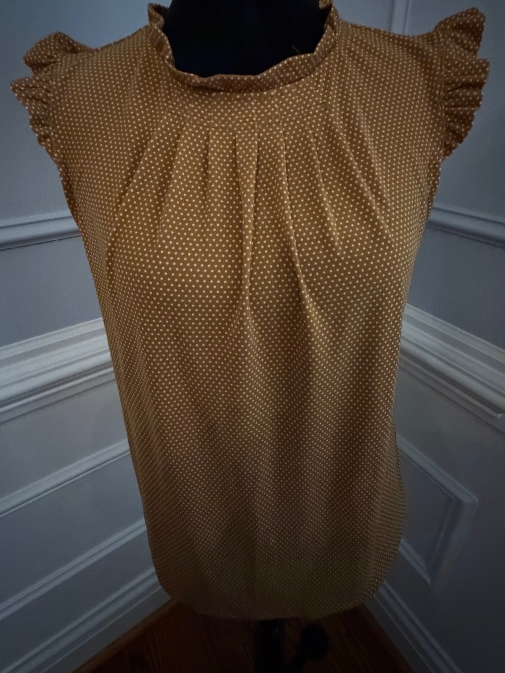 Cute ruffled sleeve blouse. Mustard color with white polka dots. Size small.
